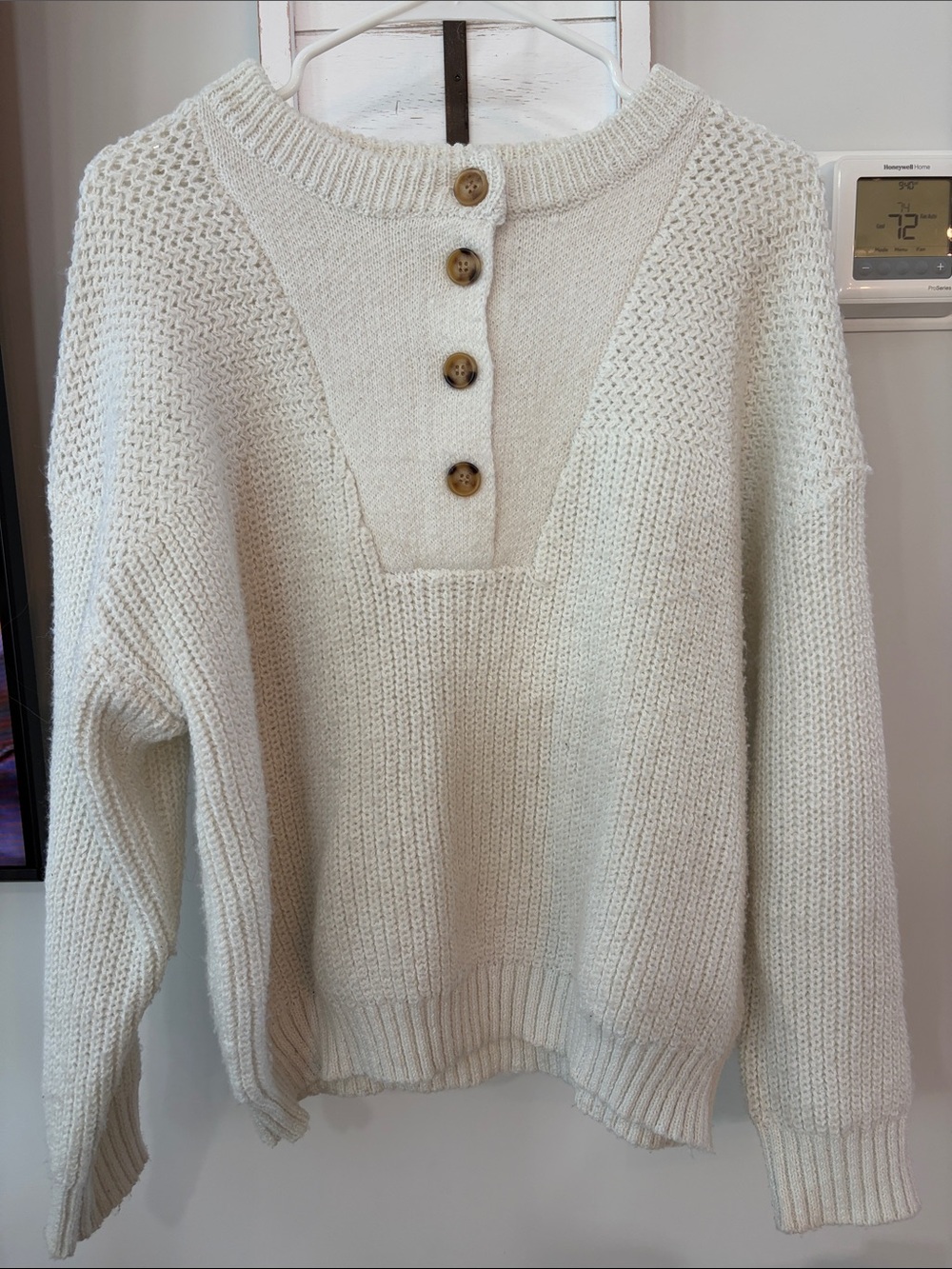 Kittenish Cream Button-Back Crewneck Sweater